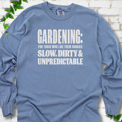 Blue Jean Comfort Colors® long sleeve T-shirt with white “Gardening: For Those Who Like Their Hobbies Slow, Dirty & Unpredictable” typography