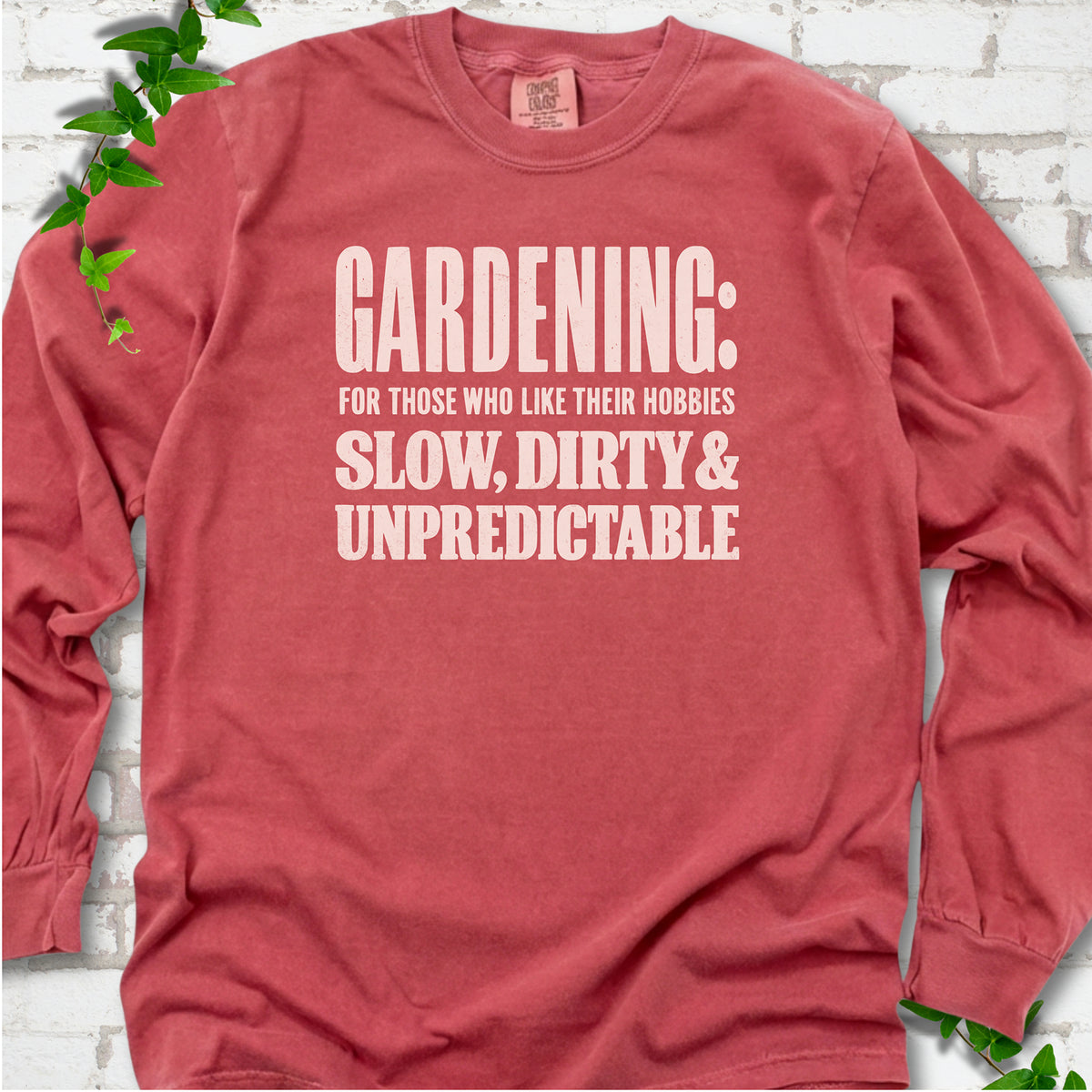 Crimson Comfort Colors® long sleeve T-shirt with white “Gardening: For Those Who Like Their Hobbies Slow, Dirty & Unpredictable” typography