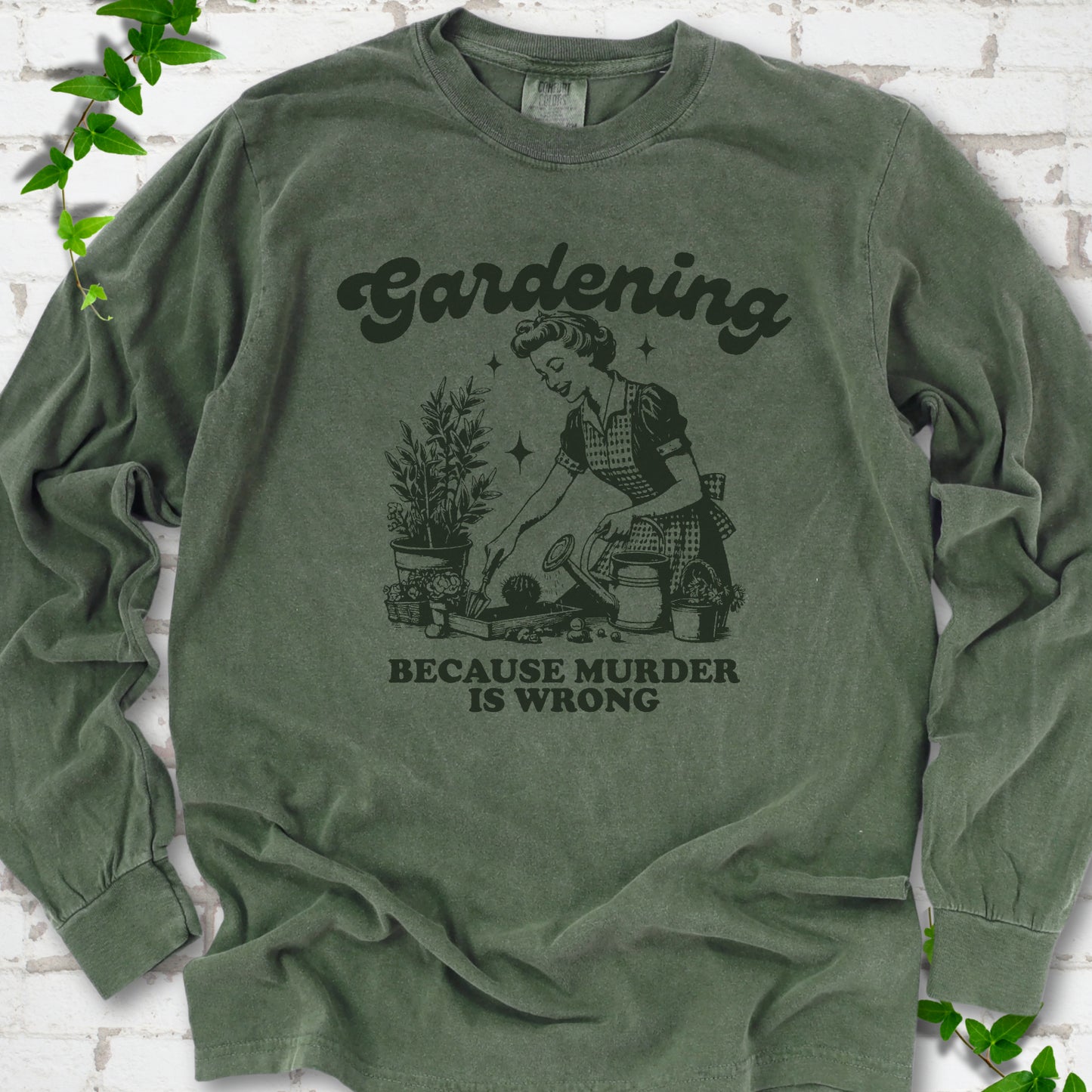 Hemp Comfort Colors® long sleeve T-shirt flat lay with retro Gardening Because Murder is Wrong artwork.