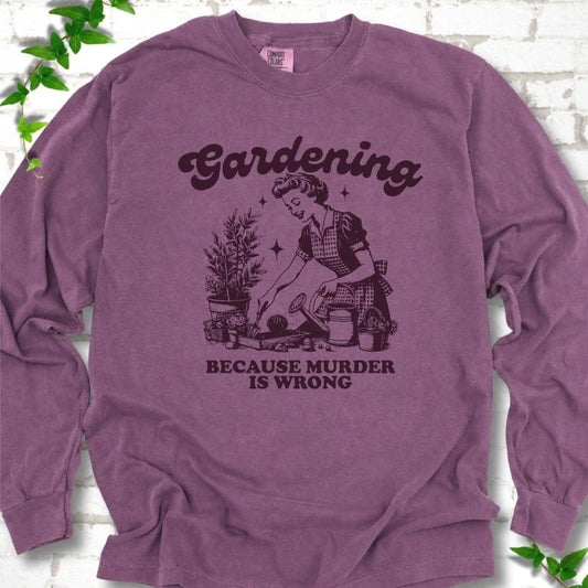 Berry Comfort Colors® long sleeve T-shirt flat lay with retro Gardening Because Murder is Wrong artwork.
