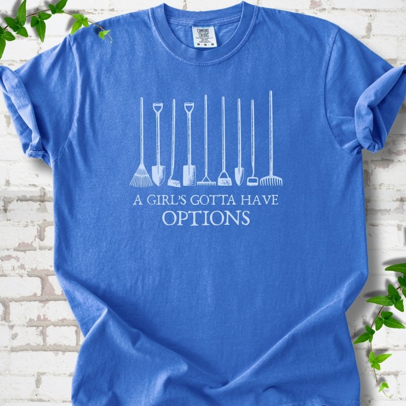 Flo Blue Comfort Colors® T-shirt with A Girl's Gotta Have Options garden tools graphic