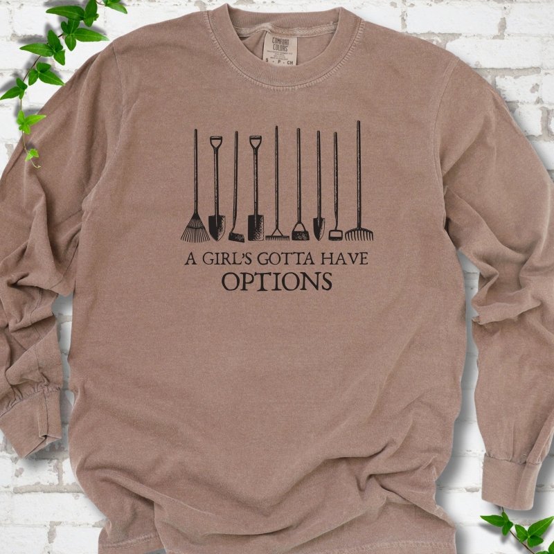 Espresso Comfort Colors® long sleeve T-shirt with A Girl's Gotta Have Options garden tools graphic
