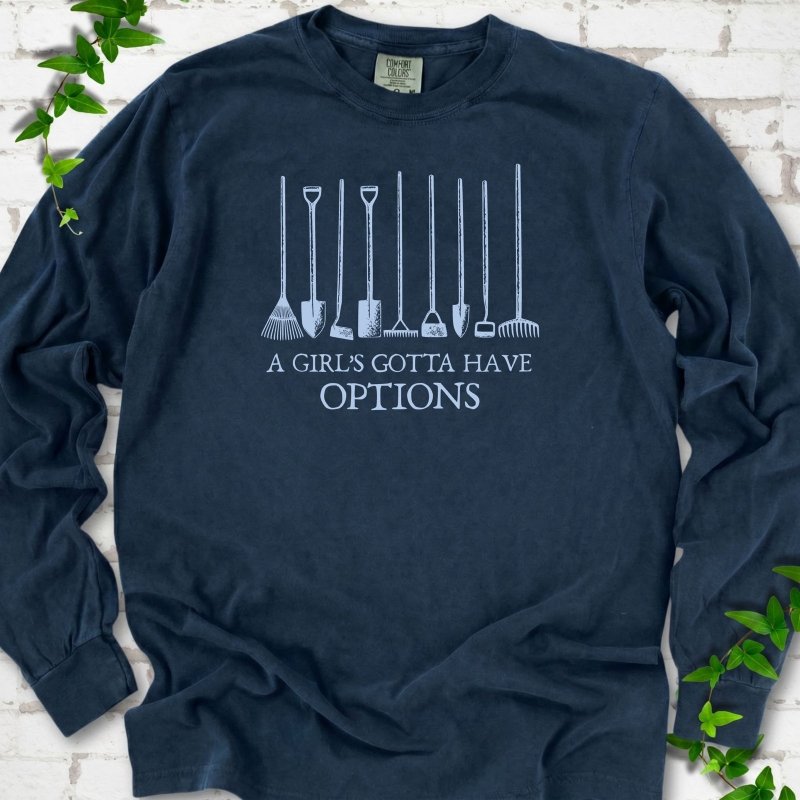 Midnight Comfort Colors® long sleeve T-shirt with A Girl's Gotta Have Options garden tools graphic