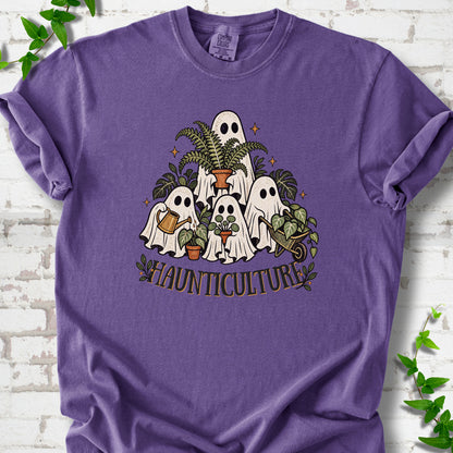 Grape Comfort Colors® T-shirt featuring four friendly gardening ghosts with houseplants and the word Haunticulture