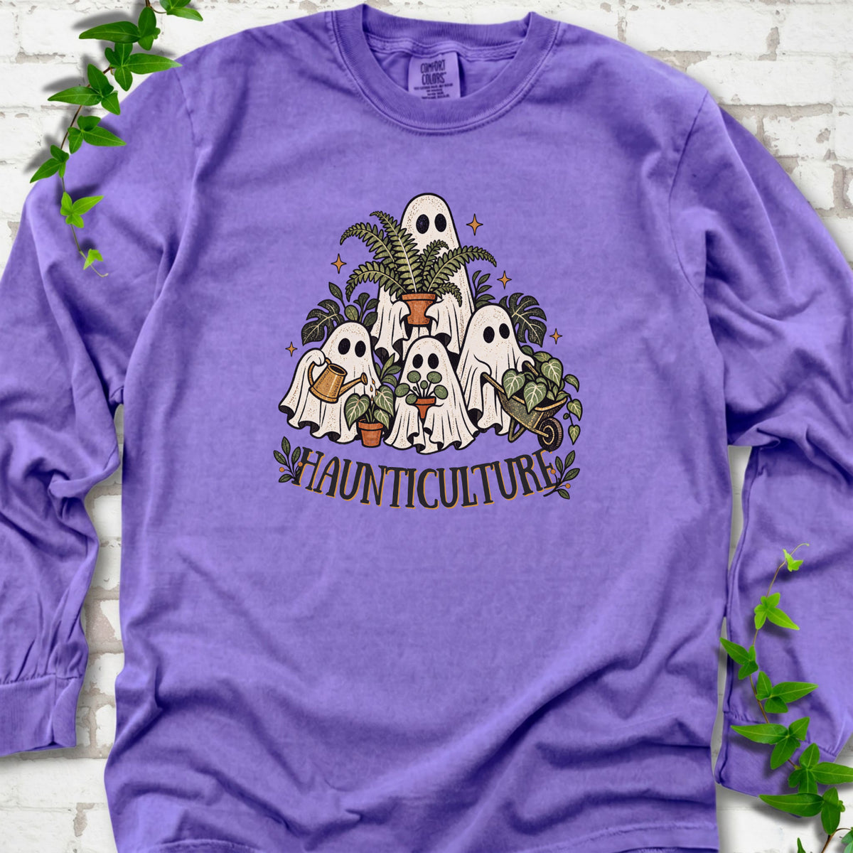 Violet Comfort Colors® long sleeve T-shirt featuring four friendly gardening ghosts with houseplants and the word Haunticulture