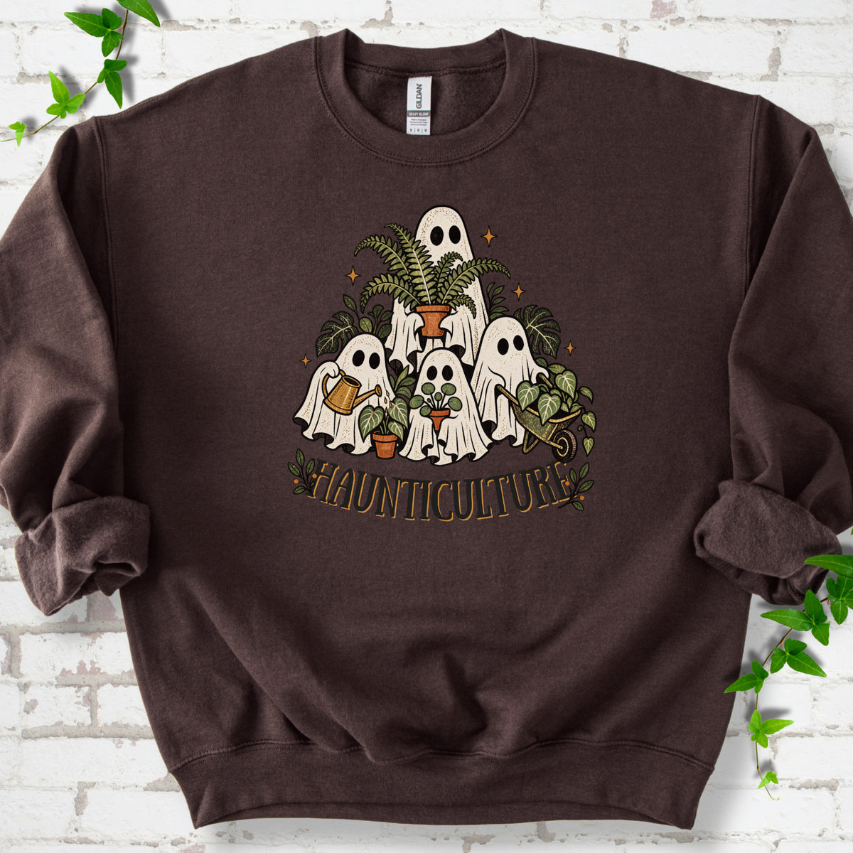Dark Chocolate Gildan® 18000 crewneck sweatshirt featuring four friendly gardening ghosts with houseplants and the word Haunticulture
