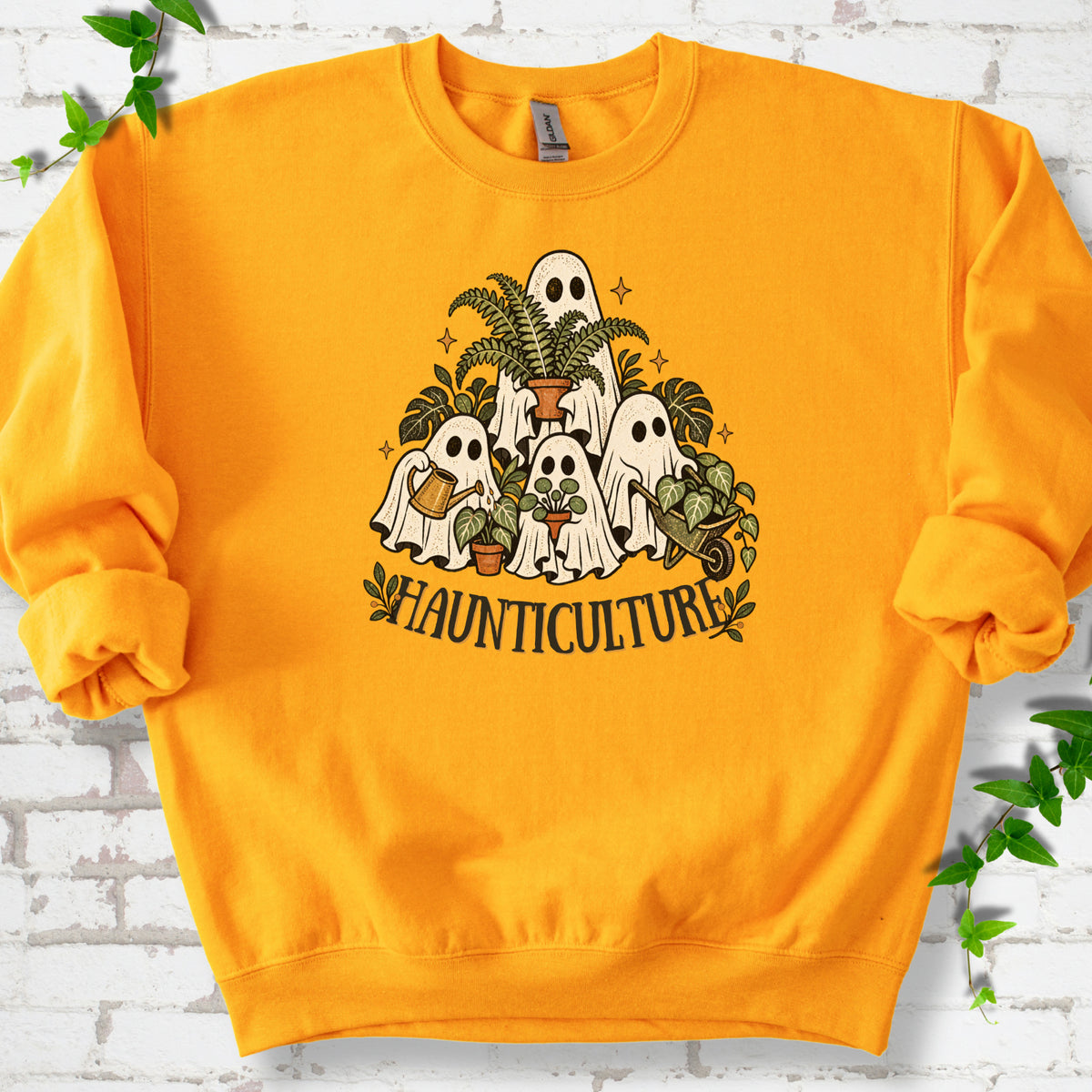 Gold Gildan® 18000 crewneck sweatshirt featuring four friendly gardening ghosts with houseplants and the word Haunticulture