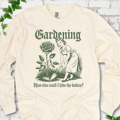 Ivory Comfort Colors® long sleeve T-shirt flat lay with black Hide the Bodies retro gardening artwork.