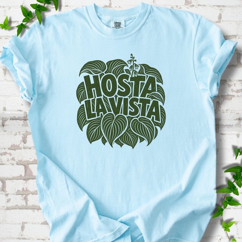 Chambray Comfort Colors® T-shirt with distressed dark green Hosta La Vista lettering surrounded by hosta leaves