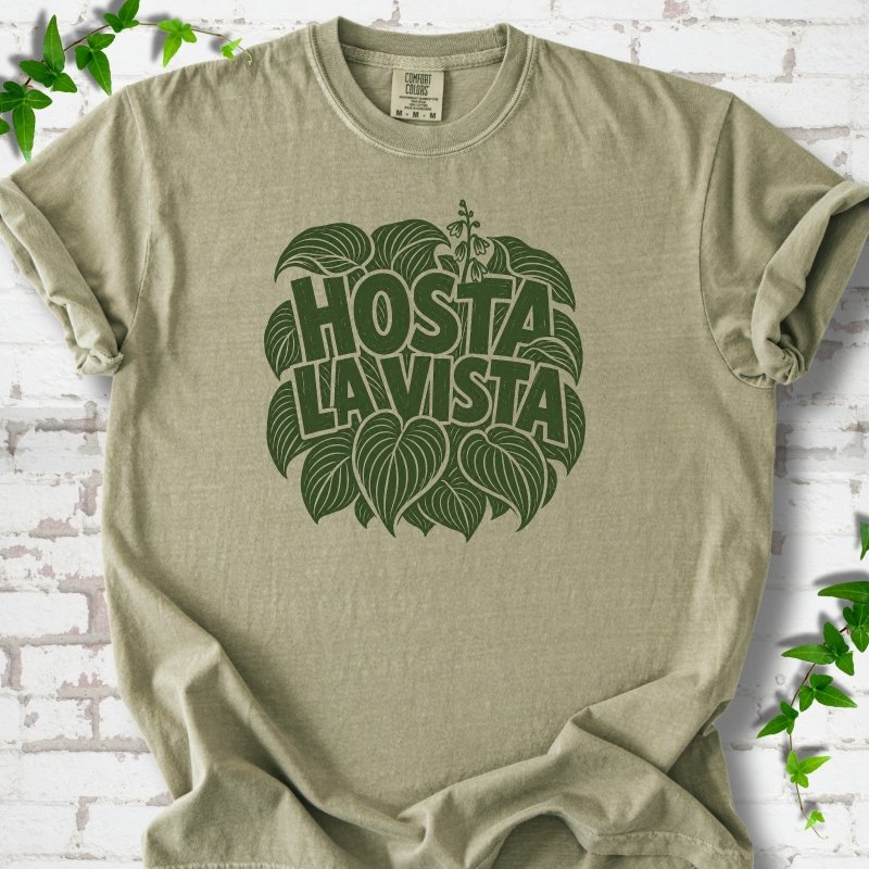 Khaki Comfort Colors® T-shirt with distressed dark green Hosta La Vista lettering surrounded by hosta leaves