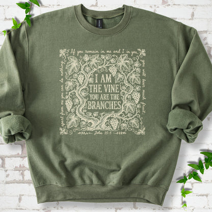 Military Green Gildan® 18000 crewneck sweatshirt flat lay featuring John 15:5 text framed by grapevines.