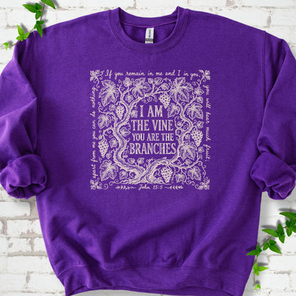 Purple Gildan® 18000 crewneck sweatshirt flat lay featuring John 15:5 text framed by grapevines.