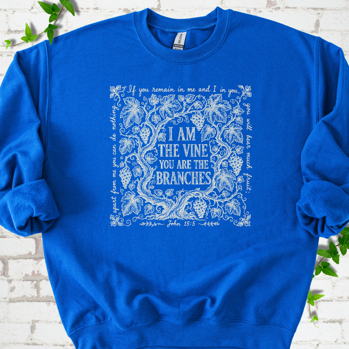 Royal Gildan® 18000 crewneck sweatshirt flat lay featuring John 15:5 text framed by grapevines.
