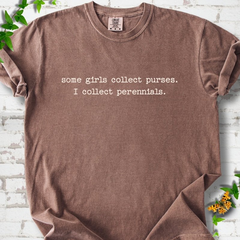 Espresso Comfort Colors® T-shirt front mockup featuring Cream typewriter-style text reads “some girls collect purses. I collect perennials.” in a centered two-line layout.