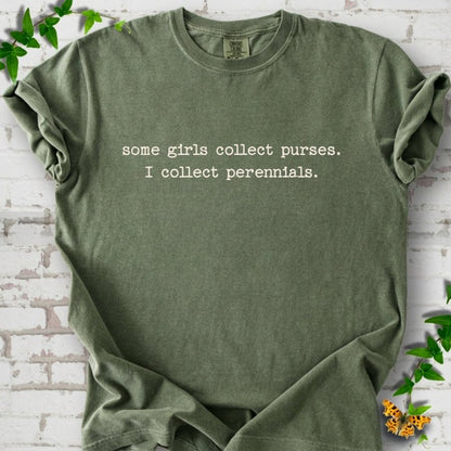 Moss Comfort Colors® T-shirt front mockup featuring Cream typewriter-style text reads “some girls collect purses. I collect perennials.” in a centered two-line layout.