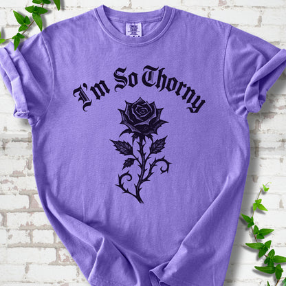 Violet Comfort Colors® T-shirt flat lay with a distressed Gothic blackletter I'm So Thorny rose design.