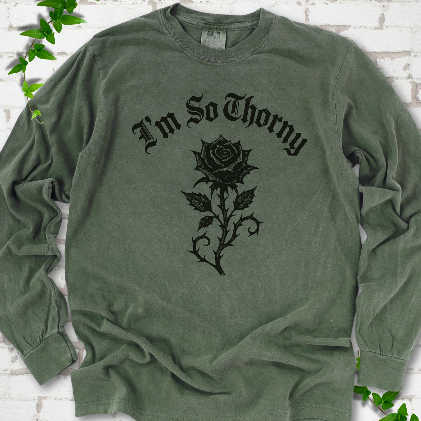Hemp Comfort Colors® long sleeve T-shirt flat lay with a distressed Gothic blackletter I'm So Thorny rose design.