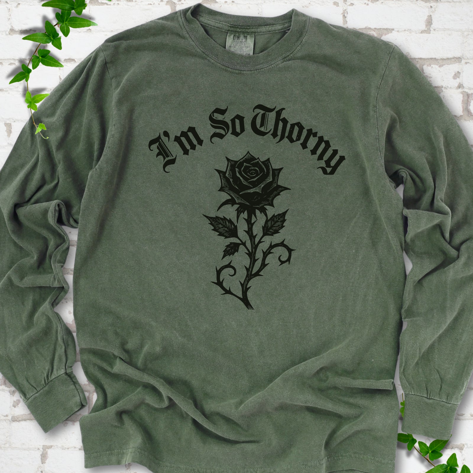 Hemp Comfort Colors® long sleeve T-shirt flat lay with a distressed Gothic blackletter I'm So Thorny rose design.