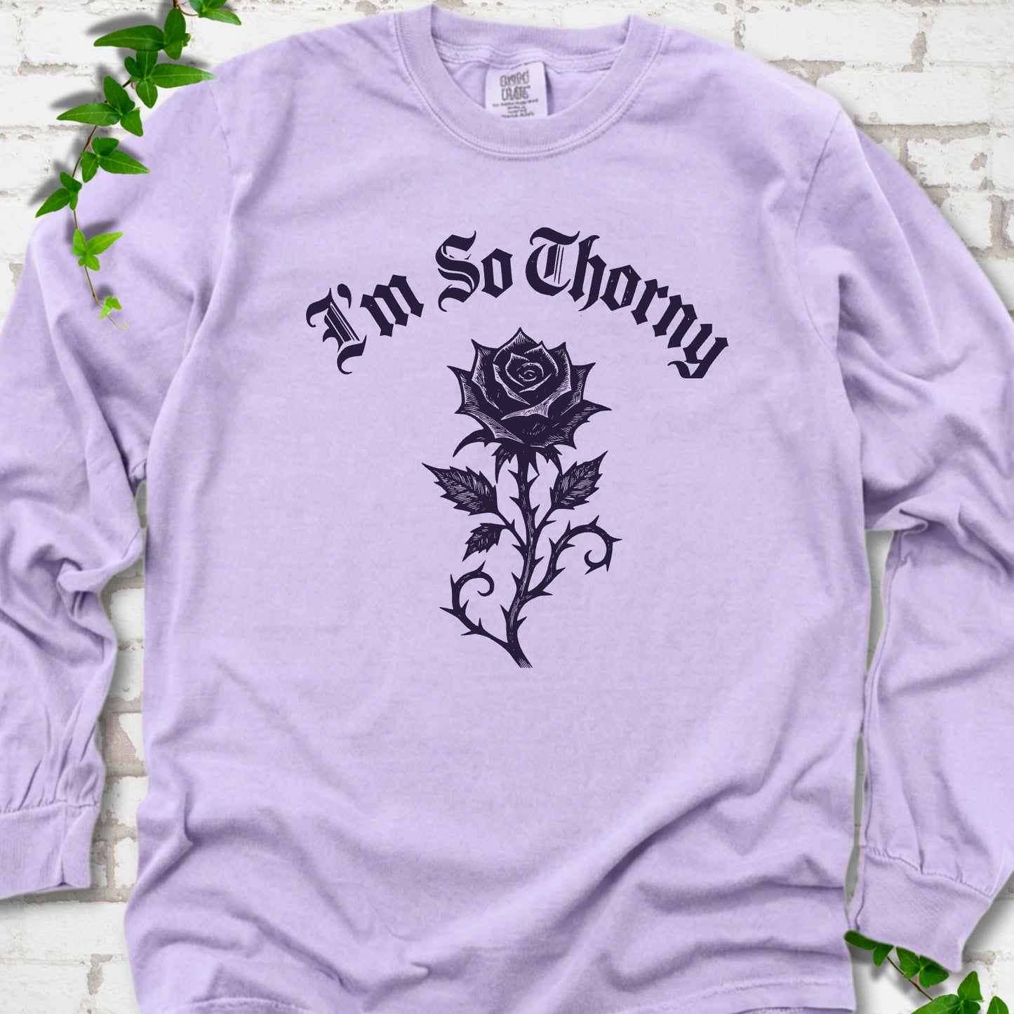 Orchid Comfort Colors® long sleeve T-shirt flat lay with a distressed Gothic blackletter I'm So Thorny rose design.