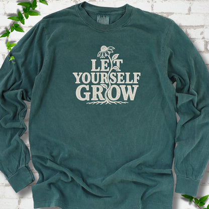 Blue Spruce Comfort Colors® long sleeve T-shirt with distressed Let Yourself Grow flower graphic