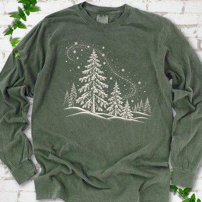Hemp Comfort Colors long sleeve T-shirt flat lay with white snow-covered spruce and pine forest design