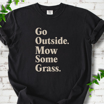 Black Comfort Colors® T-shirt with cream Go Outside. Mow Some Grass. slogan