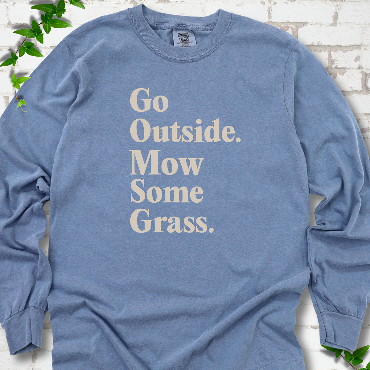 Blue Jean Comfort Colors® long sleeve T-shirt with cream Go Outside. Mow Some Grass. slogan