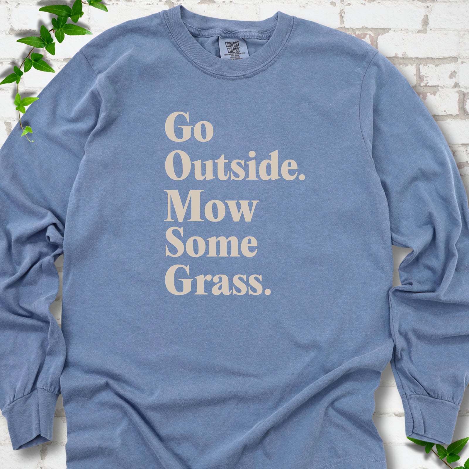 Blue Jean Comfort Colors® long sleeve T-shirt with cream Go Outside. Mow Some Grass. slogan