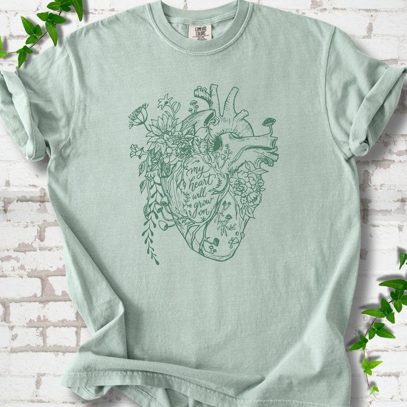 Bay Comfort Colors® T-shirt front mockup with a botanical anatomical heart and My Heart Will Grow On lettering.