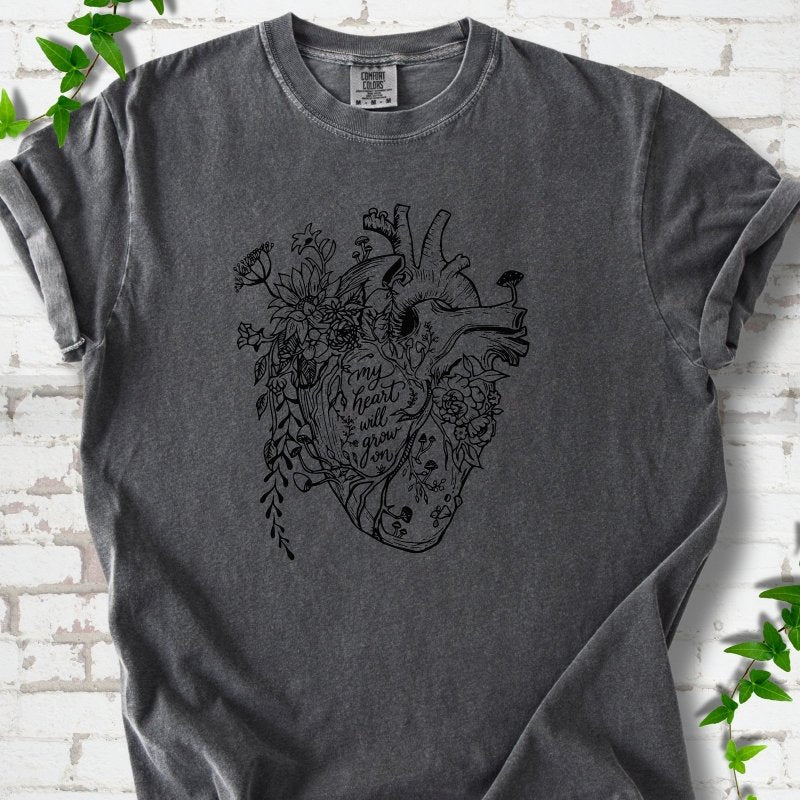 Pepper Comfort Colors® T-shirt front mockup with a botanical anatomical heart and My Heart Will Grow On lettering.