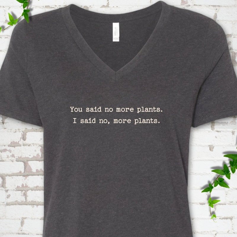 Dark Grey Heather Bella Canvas® V-neck T-shirt flat lay featuring the words You said no more plants. I said no, more plants.