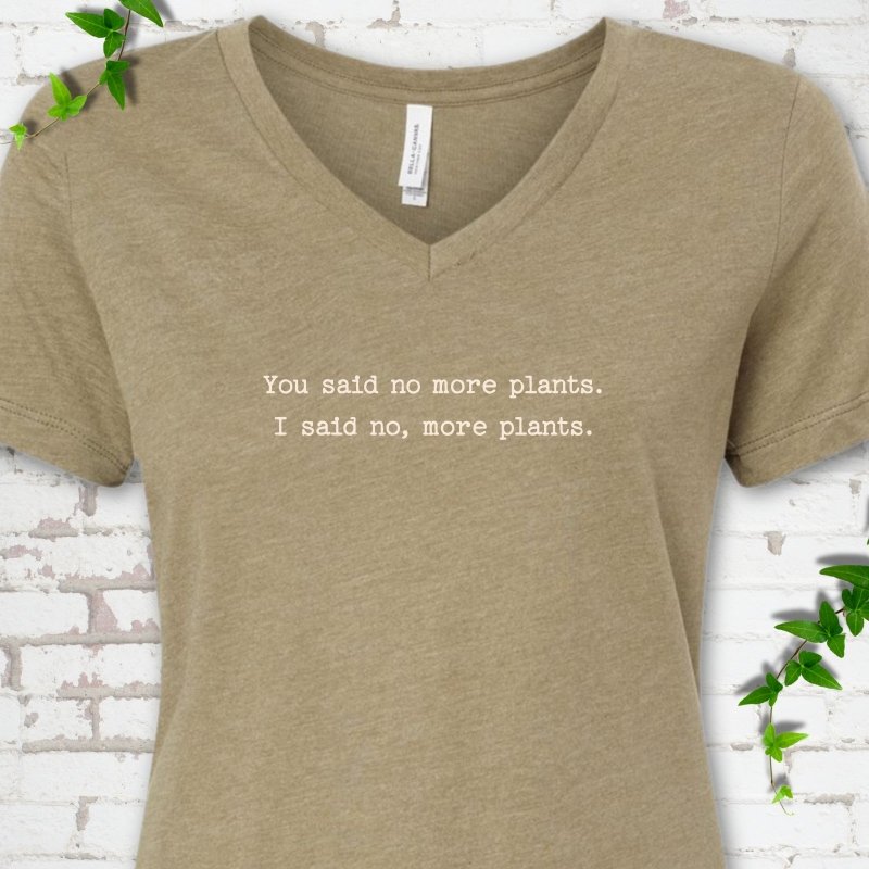 Heather Olive Bella Canvas® V-neck T-shirt flat lay featuring the words You said no more plants. I said no, more plants.