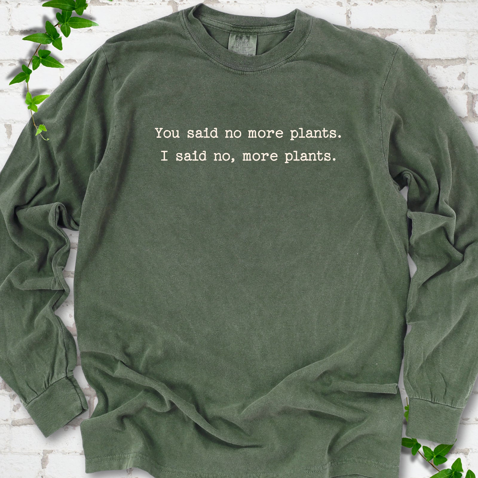 Hemp Comfort Colors® long sleeve T-shirt flat lay featuring the words You said no more plants. I said no, more plants.
