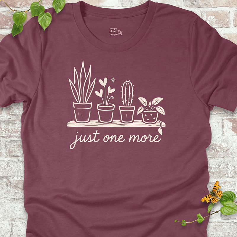 Funny plant addict tee printed on a warm burgundy shirt with line art of potted plants