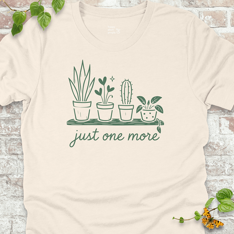 Lightweight plant collector tee with illustrated houseplants on a creamy off-white shirt