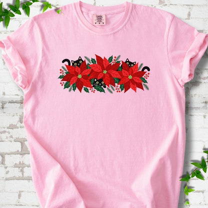 Blossom Comfort Colors® T-shirt shown flat with black cats peeking through red poinsettias and holiday greenery