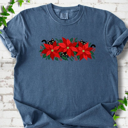 Denim Comfort Colors® T-shirt shown flat with black cats peeking through red poinsettias and holiday greenery