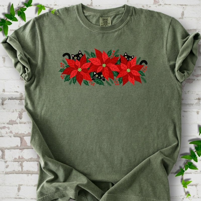 Moss Comfort Colors® T-shirt shown flat with black cats peeking through red poinsettias and holiday greenery