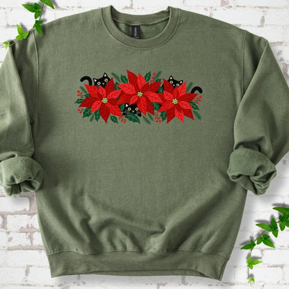 Military Green classic sweatshirt shown flat with black cats peeking through red poinsettias and holiday greenery