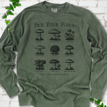 Hemp Comfort Colors® long sleeve T-shirt flat lay featuring a Pick Your Poison field guide of toxic North American mushrooms.