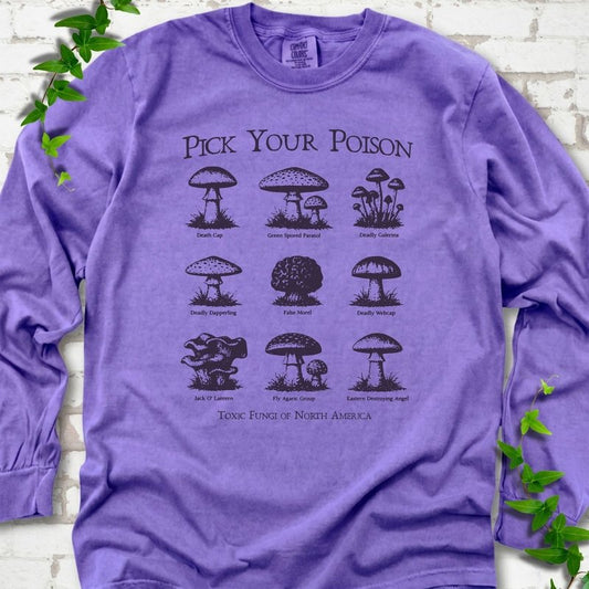 Violet Comfort Colors® long sleeve T-shirt flat lay featuring a Pick Your Poison field guide of toxic North American mushrooms.
