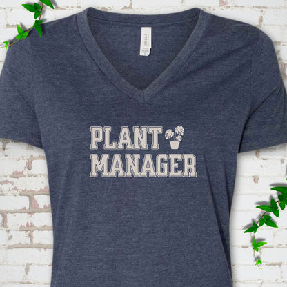 Heather Navy Bella Canvas® V-neck T-shirt front mockup featuring the collegiate Plant Manager design with a potted monstera.