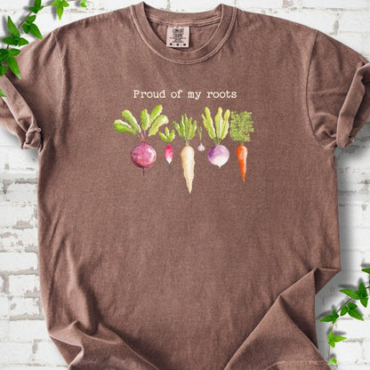Espresso Comfort Colors® T-shirt shown flat with "Proud of My Roots" text above watercolor-style root vegetables