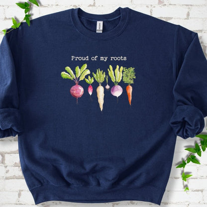 Navy classic sweatshirt shown flat with "Proud of My Roots" text above watercolor-style root vegetables