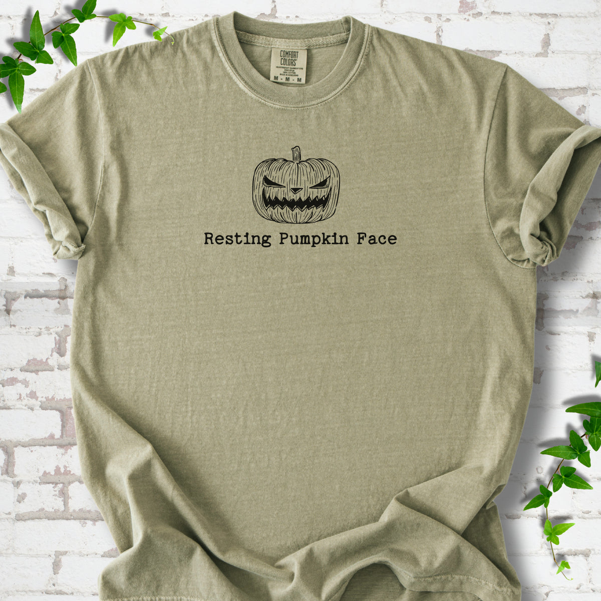Resting Pumpkin Face funny Halloween T-shirt in Khaki with jack-o'-lantern face graphic