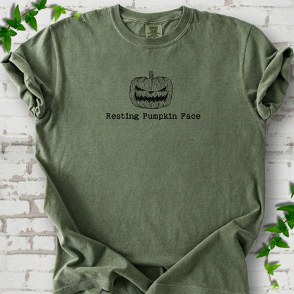 Resting Pumpkin Face funny Halloween T-shirt in Moss with jack-o'-lantern face graphic
