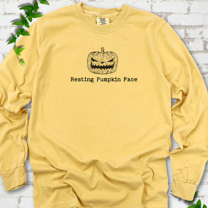 Resting Pumpkin Face funny Halloween long sleeve shirt in Mustard with jack-o'-lantern face graphic