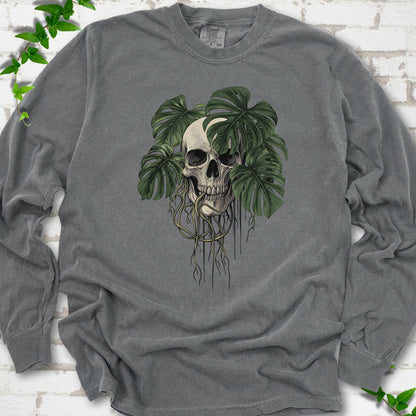 Pepper Comfort Colors T-shirt shown flat with the Root Bound Monstera skull and trailing roots graphic