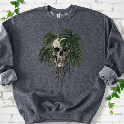Dark Heather classic sweatshirt shown flat with the Root Bound Monstera skull and trailing roots graphic