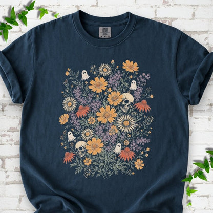 Midnight Comfort Colors® T-shirt flat lay featuring a colorful wildflower bouquet with tiny ghosts and skulls.